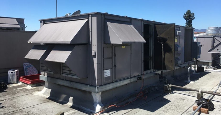 Commercial rooftop HVAC unit serviced by Cool Aid